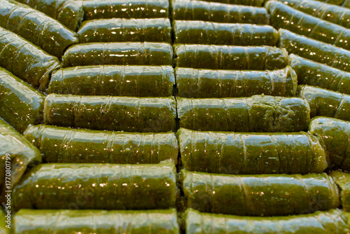 Traditional pistachio rolled dessert baklava.