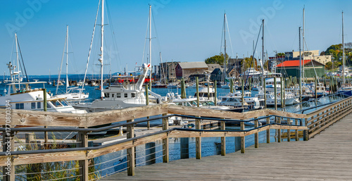 Harbor Boardwalk:  A wooden walkway passes along the waterfront in Belfast, Maine.
