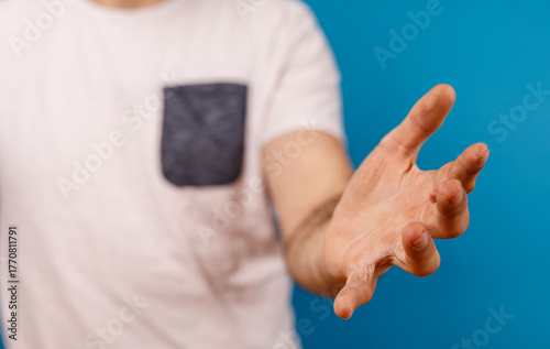 An image of a person reachi...