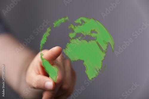 A human hand interacts with...