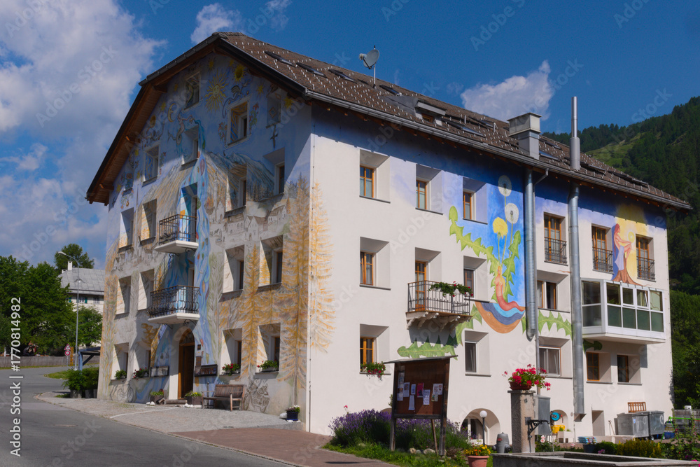 Fototapeta premium Characteristic building in Val Müstair (German: Münstertal, Italian: Val Monastero), Canton Graubünden, Switzerland