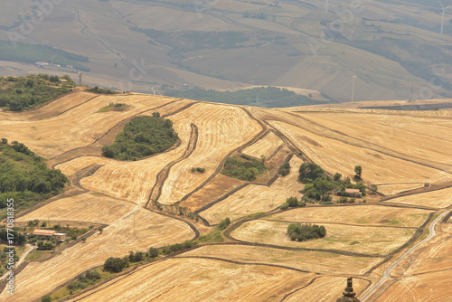 Aerial View of Golden Harvested Fields and Hills in Southern Italy Landscape