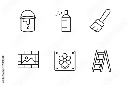 Tools and materials for home renovation featuring paint, brushes, and decor items