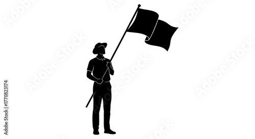 Silhouette of a person holding two flags on a pole, wearing a hat and standing.