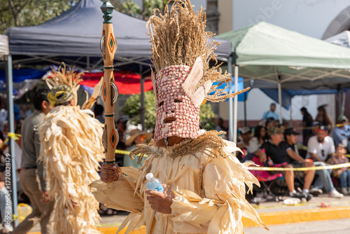 Sonajeros dancers wearing colorful traditional costumes, in the popular festival honoring Saint Joseph and the Holy Family in Zapotlan el grande, Ciudad Guzmán, Jalisco, Los Mazorqueros