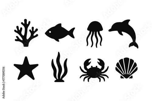 Underwater silhouette icons: marine life set featuring fish, coral, and dolphin