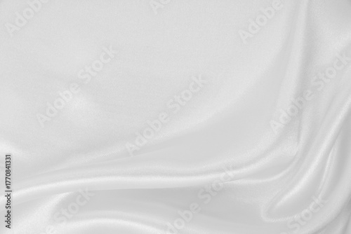 Smooth elegant white silk or satin luxury cloth texture as wedding background. Luxurious background design