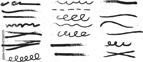 Collection of hand drawn brush strokes underlines and scribbles in black ink on white background