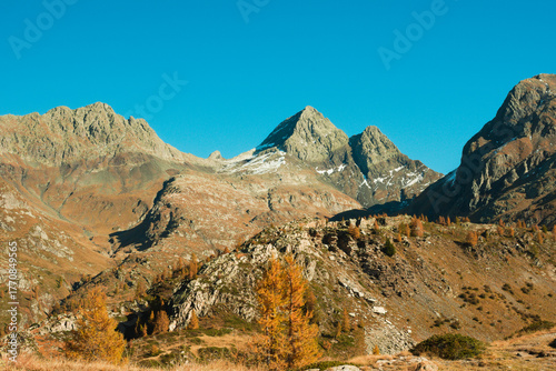 Photos The characteristic double-pyramid-shape of the Alpine peak Pizzo del Diavolo di Tenda in the stunning autumnal colors landscape of the Orobie (Bergamo Alps)