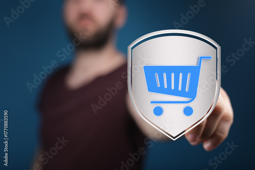 A man holds a shield with a...