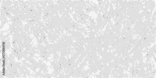 Abstract textured background with irregular light and dark gray splatters on a pale gray canvas