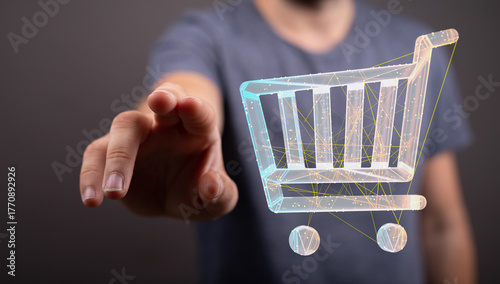 Foto Hand reaching out to interact with a digital shopping cart graphic, representing online retail and e-commerce transactions