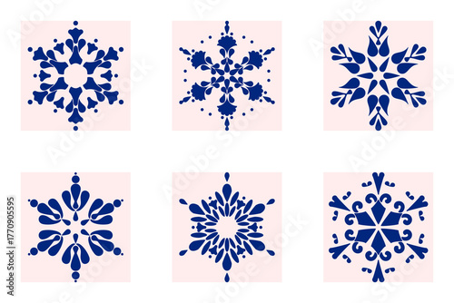 A collection of 6 blue folk-style snowflake patterns on a pastel pink background, perfect for winter decorations, holiday cards, seamless patterns, prints, wallpapers, or Scandinavian crafts.