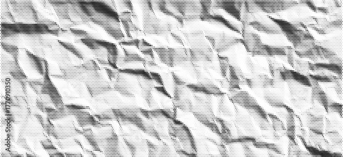 Vintage halftone crumpled paper texture background. Abstract dotted wrinkle pattern. Black torn collage print surface for retro poster or punk art overlays.