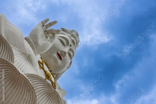 Massive big Buddha sculpture in Wat Rong Khun Temple in Chiang Rai, Thailand