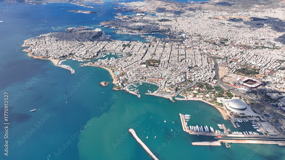 Obraz premium Aerial drone photo of famous port of Piraeus, Marina Zeas, Tourkolimano and area of Phaliron as seen from high altitude, Attica, Greece