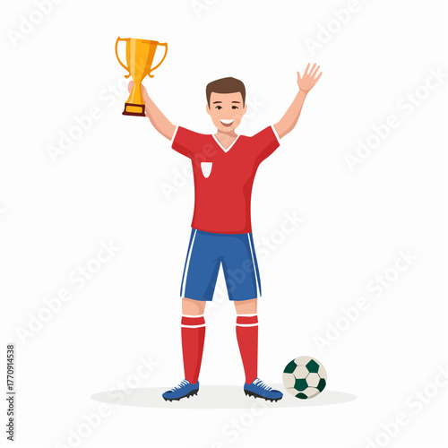 A soccer player in a red jersey celebrates a victory, holding a trophy and raising his arms.