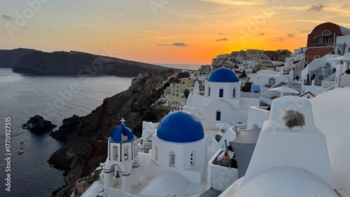 Photos Sunset View of Blue Domes and White Houses in Oia, Santorini, Greece