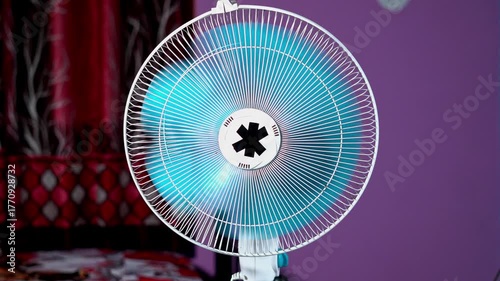 Air Cooling Fan in Home. Electric Fan Blowing Indoors at Home 4K.
