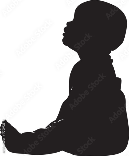Silhouette of a baby sitting