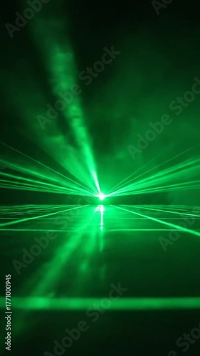 Bright Green Laser Beams Create Light Show Effect With Smoke In Dark Room