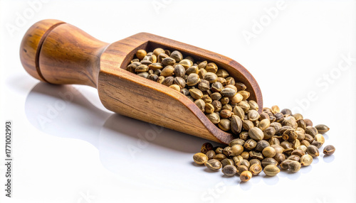 Hemp Seeds in Wooden Scoop on White