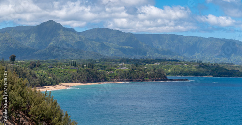 View of the north coast of the island of Kauai from Kilauea Point to Princeville and Hanalei. A sweeping panorama that includes the rugged, green cliffs of the Nāpali Coast in the distance.