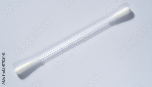 Essential hygiene tool a soft white cotton bud with a transparent shaft, perfect for delicate cleaning and beauty routines