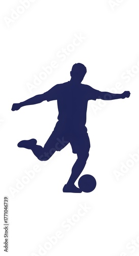 Silhouette of a man kicking a soccer ball