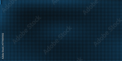 A blue screen with a pattern of dots and lines. The blue screen is lit up and he is a projection of some sort