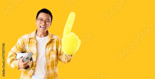 Male Asian soccer fan with ...