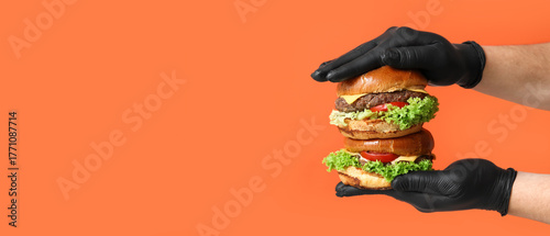 Male hands in black gloves ...
