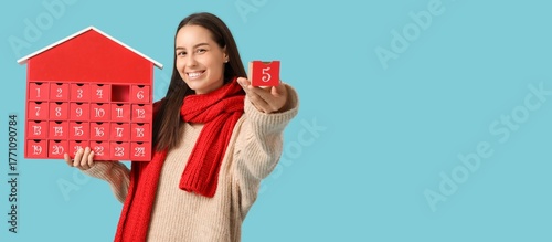 Happy young woman with Chri...