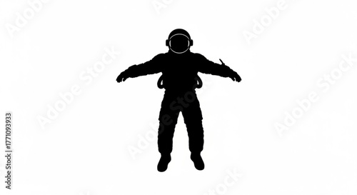 Silhouette of astronaut in space suit with arms outstretched against white background image view