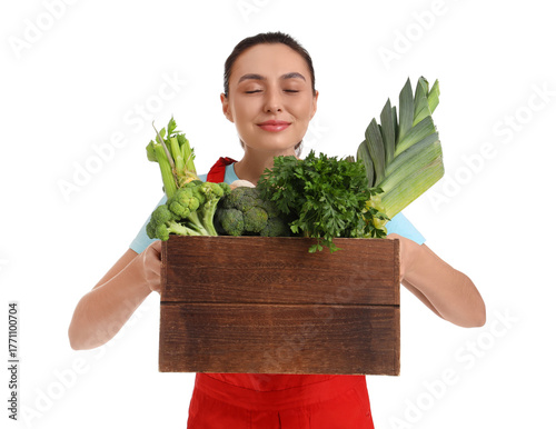 Female farmer with box of v...