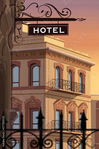 Ornate hotel building with a vintage sign at sunset