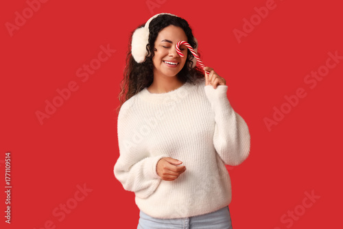 Smiling young woman in whit...