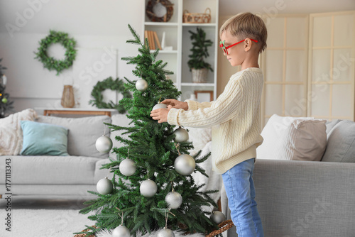 Cute little boy in funny gl...