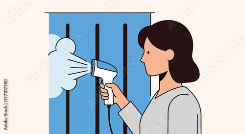Woman steaming a curtain