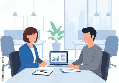 Two colleagues discussing financial data displayed on a laptop screen in a modern office setting.