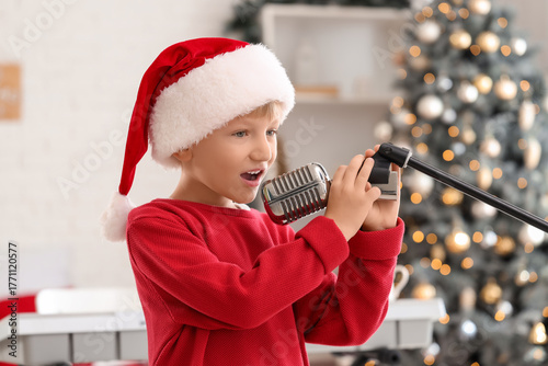 Cute little boy in Santa ha...