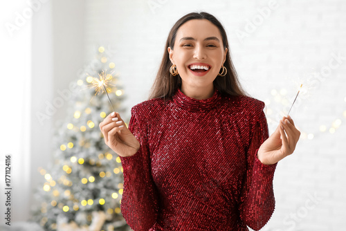 Happy young woman with Chri...