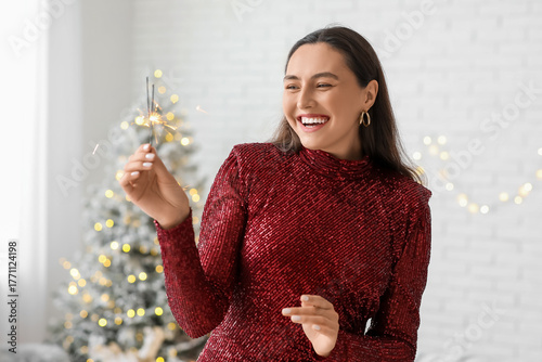 Happy young woman with Chri...