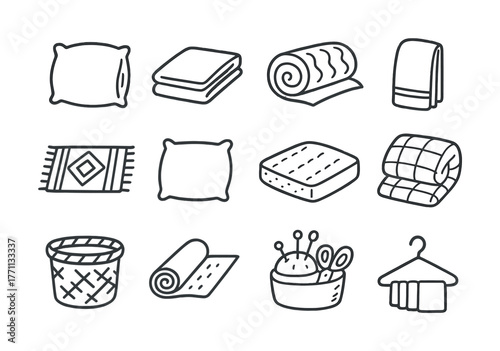 Collection of doodle style bed and bath essentials: pillows, towels, and baskets
