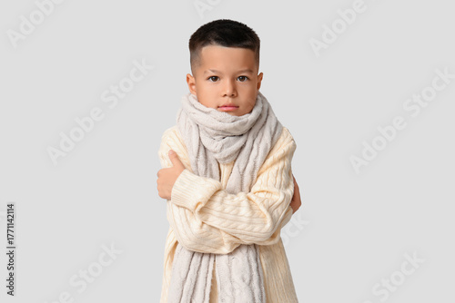 Cute little Asian boy in kn...