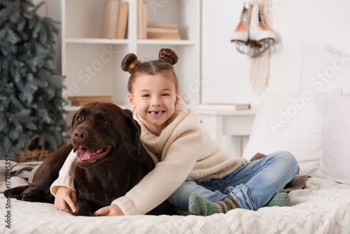 Cute happy girl and Labrado...