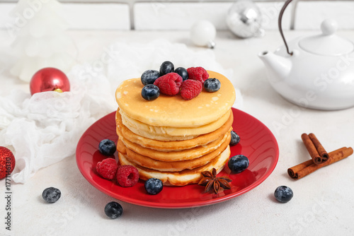 Plate of sweet pancakes wit...
