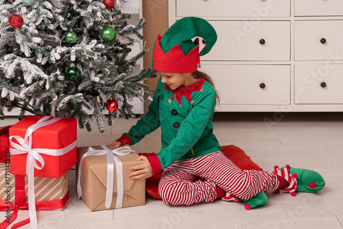 Cute little girl in elf cos...
