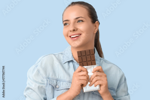 Young woman with chocolate ...