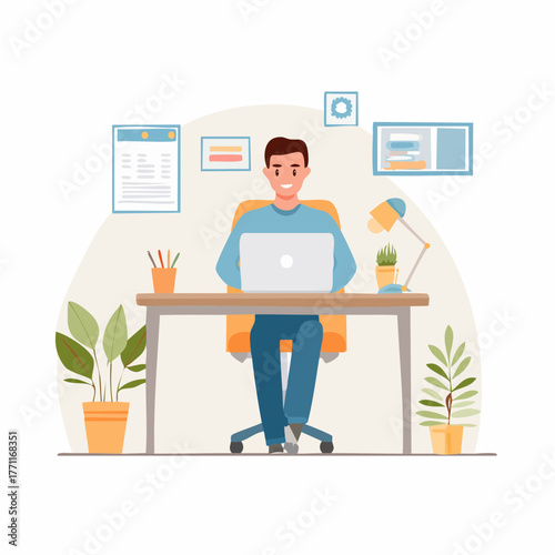 A man is sitting at a desk, working on a laptop in a bright office environment.